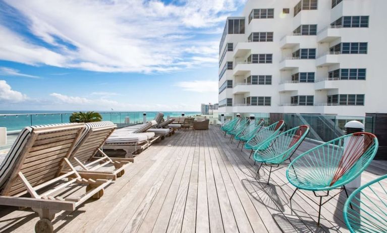Terrace with lounge seating at Nautilus Sonesta Miami Beach.