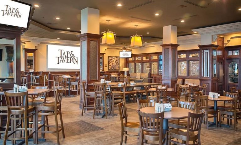 Dining area perfect for coworking at Embassy Suites By Hilton San Francisco Airport Waterfront.