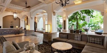 Lobby and coworking lounge at Embassy Suites By Hilton San Francisco Airport Waterfront.