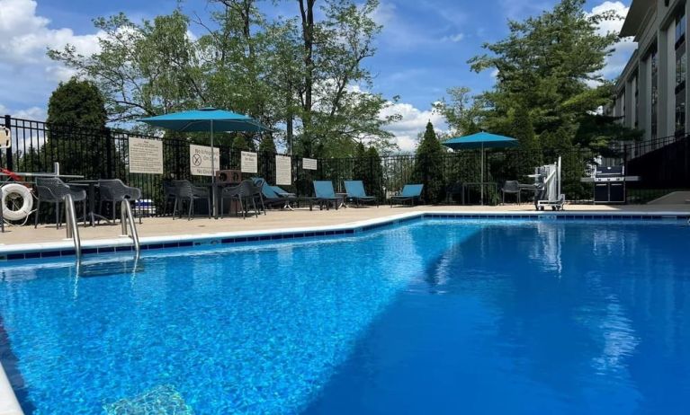 Refreshing outdoor pool at Hampton Inn Bloomington.
