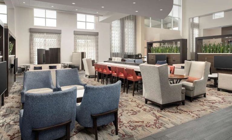 Lobby and coworking lounge at Embassy Suites By Hilton Birmingham.