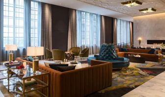 Comfortable and stylish lobby lounge with fireplace at The Allegro Royal Sonesta Hotel Chicago Loop.