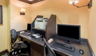 Business center with computers, printer and ergonomic chairs 	at Sonesta ES Suites Atlanta - Perimeter Center.