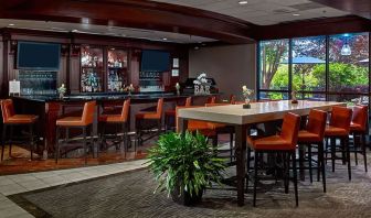 Hotel bar and lounge area at Sonesta Atlanta Airport North.