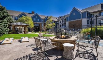 Patio with lounge seating and fire pit at Sonesta ES Suites Denver South - Park Meadows.