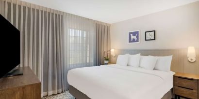 King bed at Sonesta ES Suites Denver South - Park Meadows.