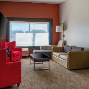 Suite with living room at Holiday Inn Express & Suites Yorkville.