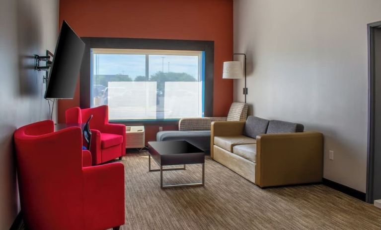 Suite with living room at Holiday Inn Express & Suites Yorkville.