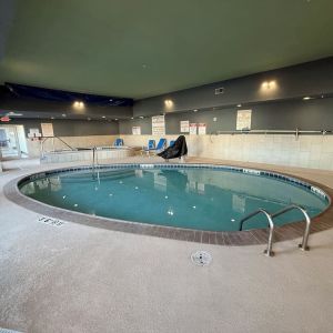 Indoor pool and hot tub at Holiday Inn Express & Suites Yorkville.