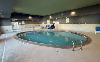 Indoor pool and hot tub at Holiday Inn Express & Suites Yorkville.