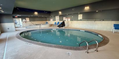 Indoor pool and hot tub at Holiday Inn Express & Suites Yorkville.