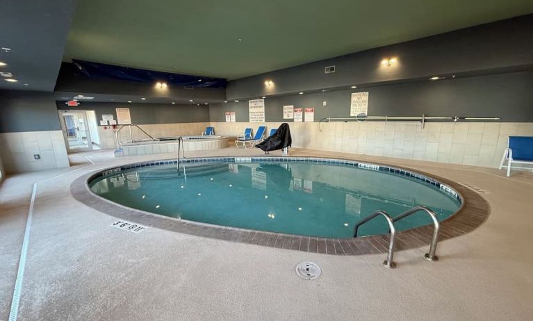 Indoor pool and hot tub at Holiday Inn Express & Suites Yorkville.