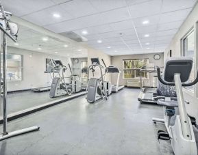 Well equipped fitness center at Country Inn & Suites By Radisson, Chicago O'Hare South.