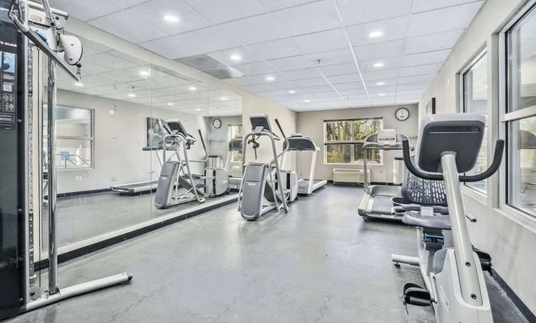 Well equipped fitness center at Country Inn & Suites By Radisson, Chicago O'Hare South.