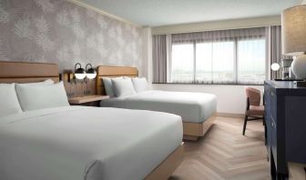 Day use twin room with work desk and natural light at Sonesta Los Angeles Airport LAX.