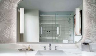 Private guest bathroom with shower at Sonesta Los Angeles Airport LAX.