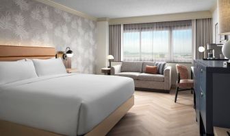 Day use room with work desk and sofa at Sonesta Los Angeles Airport LAX.