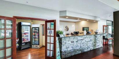 Hotel reception at Quality Inn & Suites Liberty Lake - Spokane Valley.