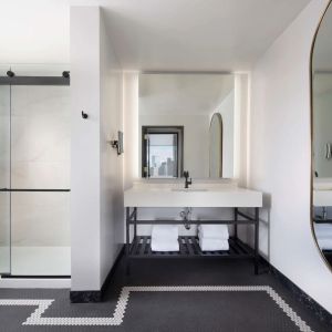 Private guest bathroom with shower at The Clift Royal Sonesta.