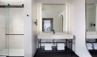 Private guest bathroom with shower at The Clift Royal Sonesta.