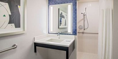 Private guest bathroom with shower at Royal Sonesta Boston.