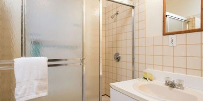 Private guest bathroom with shower at The Farrington Inn.