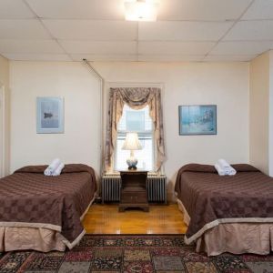 Bright and spacious day use twin room at The Farrington Inn.