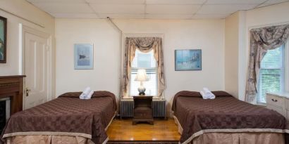 Bright and spacious day use twin room at The Farrington Inn.
