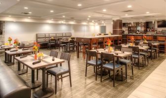 Dining area and workspace, perfect for coworking at Holiday Inn Belcamp - Aberdeen Area.