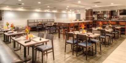 Dining area and workspace, perfect for coworking at Holiday Inn Belcamp - Aberdeen Area.