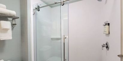 Private guest bathroom with shower and free toiletries at Holiday Inn Belcamp - Aberdeen Area.
