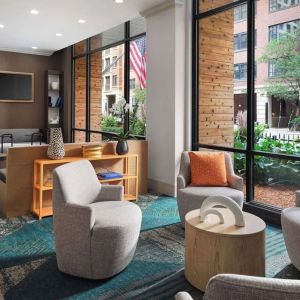 Comfortable lobby lounge and workspace at Sonesta ES Suites Chicago Downtown Magnificent Mile - Medical.