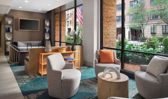 Comfortable lobby lounge and workspace at Sonesta ES Suites Chicago Downtown Magnificent Mile - Medical.