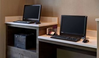 Business center with computers and printer at Sonesta ES Suites Chicago Downtown Magnificent Mile - Medical.