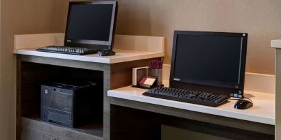Business center with computers and printer at Sonesta ES Suites Chicago Downtown Magnificent Mile - Medical.