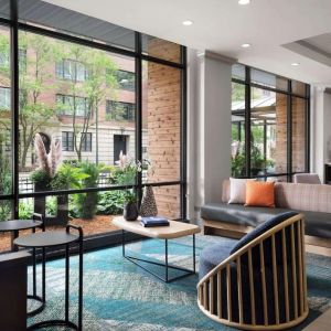 Lobby lounge and workspace, perfect for coworking at Sonesta ES Suites Chicago Downtown Magnificent Mile - Medical.
