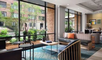 Lobby lounge and workspace, perfect for coworking at Sonesta ES Suites Chicago Downtown Magnificent Mile - Medical.
