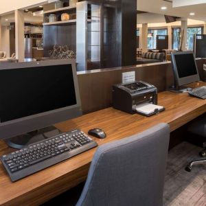 Business center with computers, printer and ergonomic chairs at Sonesta Select Seattle Bellevue Redmond.