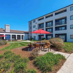 Patio and lounge seating at Sonesta Select Charlotte University Research Park.