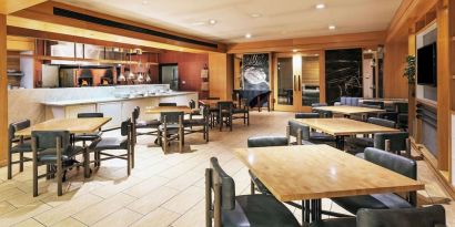 Dining area perfect for coworking at DoubleTree By Hilton Tulsa-Downtown.

