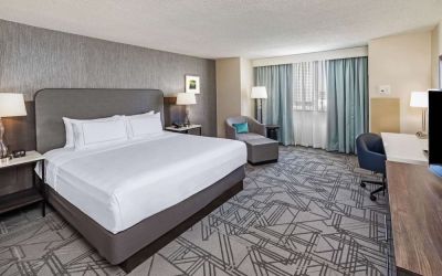 Day use room with work desk at DoubleTree By Hilton Tulsa-Downtown.