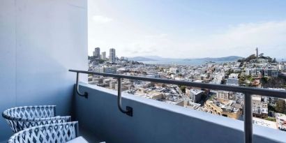 Balcony inside day use room overlooking the city at Hilton San Francisco Financial District.
