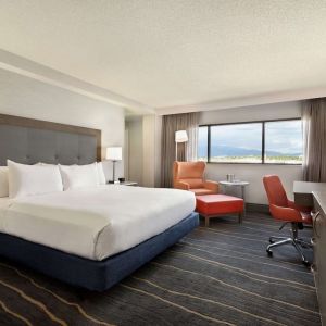 Comfortable king room with work desk and lounger at DoubleTree By Hilton Albuquerque.