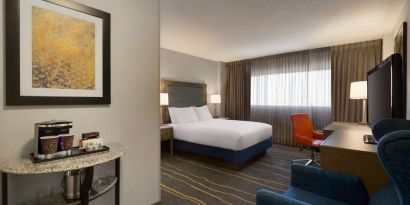 Day use room with work desk, lounger and coffee machine at DoubleTree By Hilton Albuquerque.