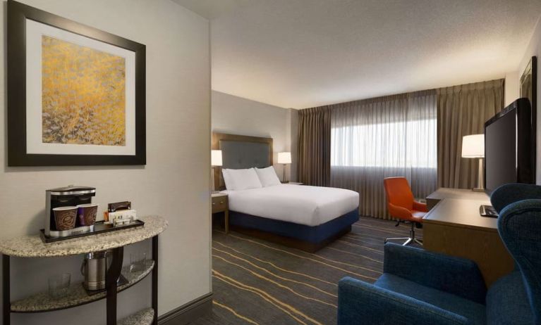 Day use room with work desk, lounger and coffee machine at DoubleTree By Hilton Albuquerque.