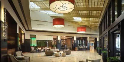 Lobby and coworking lounge at Hilton Rosemont/Chicago O'Hare.