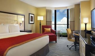 Beautiful king suite with TV, work desk and a lovely view at Hilton Rosemont/Chicago O'Hare.