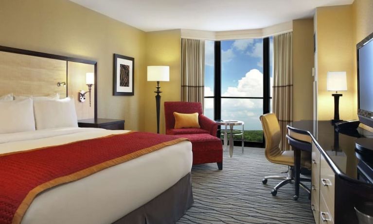 Beautiful king suite with TV, work desk and a lovely view at Hilton Rosemont/Chicago O'Hare.