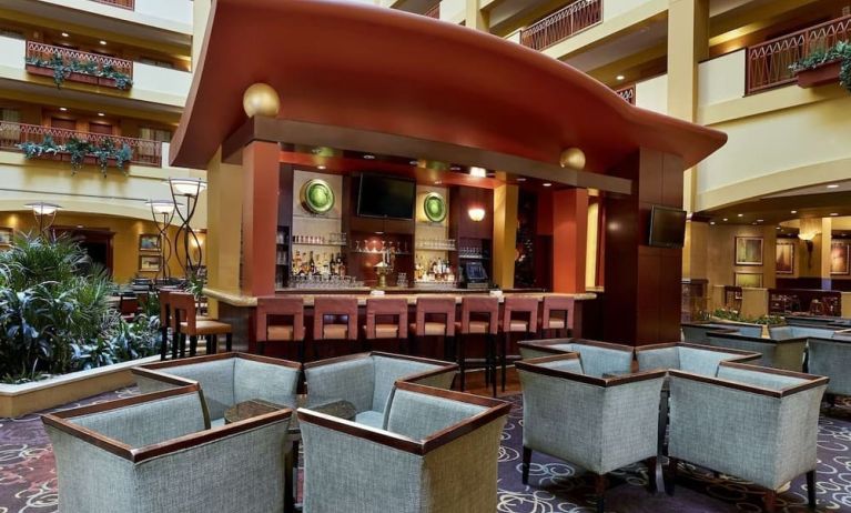 Hotel bar at Embassy Suites By Hilton Hampton Convention Center.