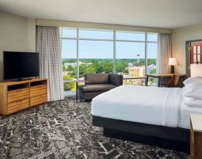 Spacious day use room with work desk overlooking the city at Embassy Suites By Hilton Hampton Convention Center.